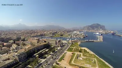 an aerial view of a city and a harbor at Kalsa Apartment in Palermo