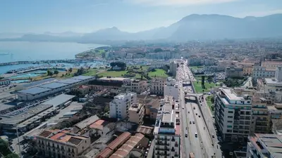 an aerial view of a city with a bridge at Harbour Front - Luxury Rooms in Palermo