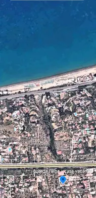 an aerial view of a city with the ocean at Guarda l'alba in Altavilla Milicia