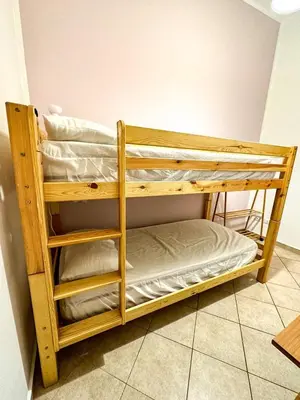 a couple of bunk beds in a room at Balat City in Palermo