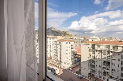 a view of a city from a window at Chez Gabriel by DomuSicily in Palermo