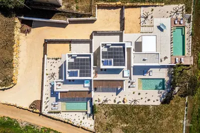 an overhead view of a house with solar panels on it at Villa Brezza in Partinico