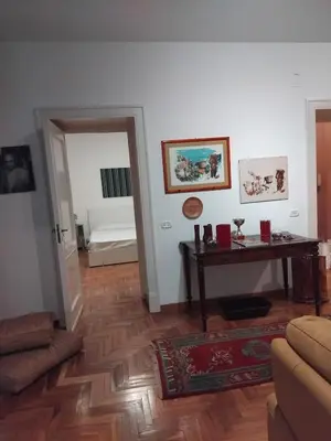 a living room with a couch and a table at la casa di Tati Palermo centro in Palermo