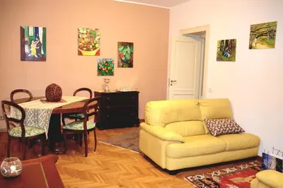 a living room with a couch and a table at la casa di Tati Palermo centro in Palermo