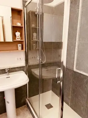 a bathroom with a shower and a sink at la casa di Tati Palermo centro in Palermo