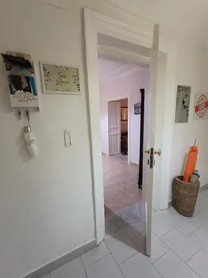 a hallway with a door leading into a room at Trip Rooms 2 in Palermo
