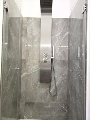 a shower in a bathroom with a glass door at Vicoletto Natalia - Proppro SRL- Palermo in Palermo