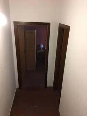 a hallway with a stairway leading to a room at Terrasini 2000 Casa Vacanze in Terrasini