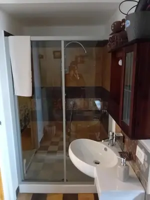 a bathroom with a shower and a sink at Vernagallo's House 2 in Palermo