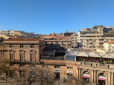 a view of a city with buildings at Apartament and suite cavour 106 in Palermo