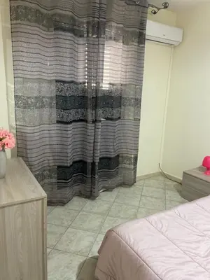 a bedroom with a bed and a shower curtain at Alle spalle della cattedrale in Palermo