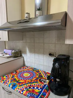 a kitchen counter with a sewing machine sitting on a table at Alle spalle della cattedrale in Palermo