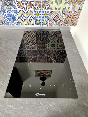 a display of tiles on a counter in a room at Vicoletto Ludovica - Proppro SRL- Palermo in Palermo