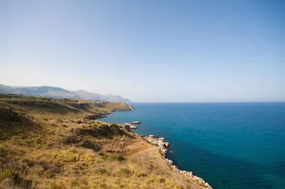 an aerial view of the ocean on a cliff at Villino Dei Gabbiani in Castellammare del Golfo