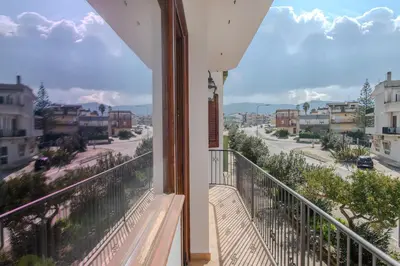 a balcony with a view of a street at LuminArt in Nuova Gibellina