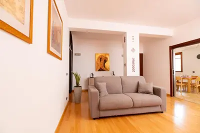 a living room with a couch and a table at LuminArt in Nuova Gibellina