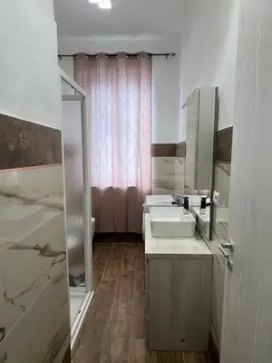 a bathroom with a sink and a shower at Trinacria in Capaci