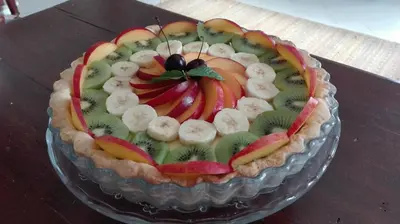 a cake with fruit in the shape of a heart at B&B Talìa in Scopello