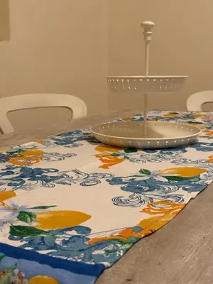 a table with a plate on top of a table at Casa marchese ,vacanze in centro -by Rentalbeb italy- in Palermo