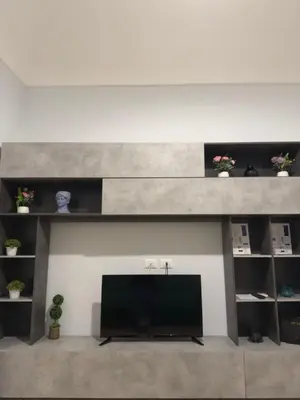a flat screen tv in a living room at Casa marchese ,vacanze in centro -by Rentalbeb italy- in Palermo