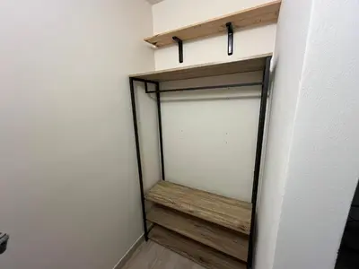 a walk in closet with a glass door at Donna Maria in Cinisi
