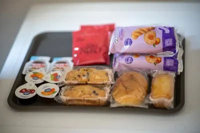 a tray of food with sandwiches and other snacks at La zagara di Alba in Palermo