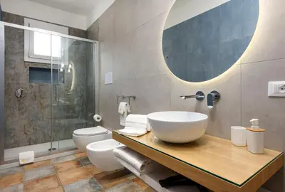 a bathroom with a sink and a toilet at Le Margherite in San Vito lo Capo
