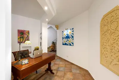 a home office with a desk and a laptop at Le Margherite in San Vito lo Capo