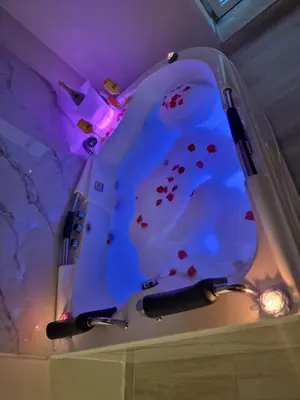 a bathroom with a toilet with blood on it at Love is in the air in Palermo