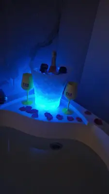 a bathroom with a blue light in a room at Love is in the air in Palermo