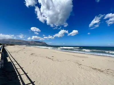 a view of a beach with the ocean at Sea Pearl House in Isola delle Femmine