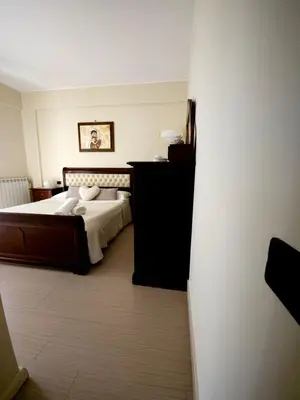 a bedroom with a bed in a room at La Casa Di Ady in Palermo