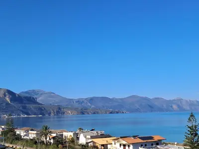 a view of the water and houses at Battigia SOLEMAR-Alcamo Marina in Alcamo Marina