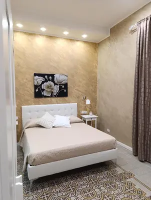 a bathroom with a sink and a shower at Anninedda Rooms in Palermo