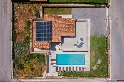 an overhead view of a house with a swimming pool at VILLA AGLEA Luxury By Sicily Home Solutions in Castellammare del Golfo