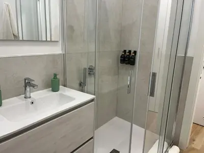 a bathroom with a shower and a sink at A Casa di Chiara in Palermo