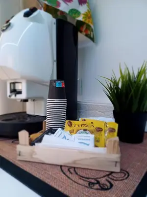 a counter top with a sewing machine and some food at Carruzzata 2 in Bagheria