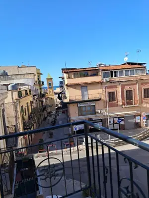 a view of a city street from a balcony at House victor in Palermo
