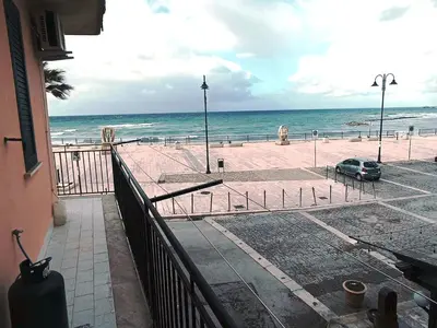 a view of the beach from a balcony at Casa di Laura - Aspra vista mare in Bagheria
