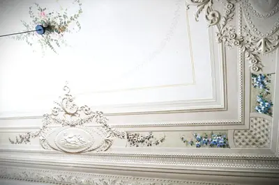 a white room with a crown on the wall at C'era una Volta a Palermo in Palermo