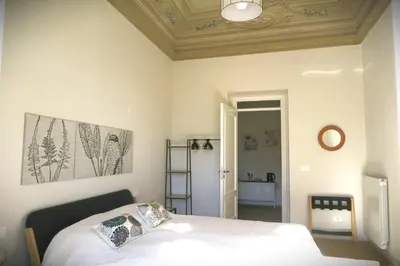 a bedroom with a bed and a ceiling at C'era una Volta a Palermo in Palermo