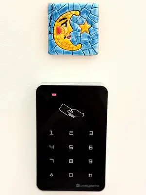 a picture of a cell phone with a moon and star on it at Appartamenti Pellegrino Centro in Palermo