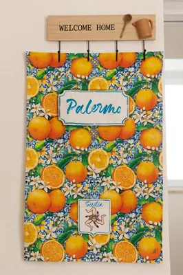 a bunch of oranges on a table with a sign at Sweet Home Pioppo in Pioppo