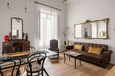 a living room with a couch and a table at Casa Palermo in Palermo