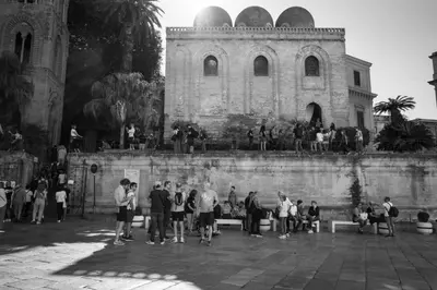 a group of people standing in front of a building at UNA Room in Palermo