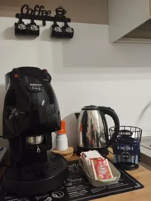a coffee maker sitting on top of a counter at Casa Palù Sicilia in Altavilla Milicia