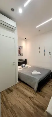 a bedroom with a bed in a room at Idea di Mare in Capaci