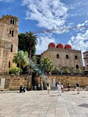 a group of people walking in front of a building at Mart Rental Apartament in Palermo