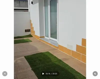 a rendering of a building with artificial grass at The Moon Suite in Palermo