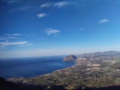 an aerial view of the ocean and a city at The Green Planet in Balestrate